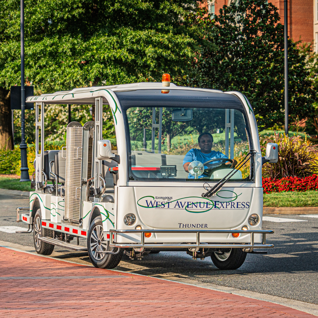 West Avenue Shuttle driving down the street West Avenue Shuttle driving down the street